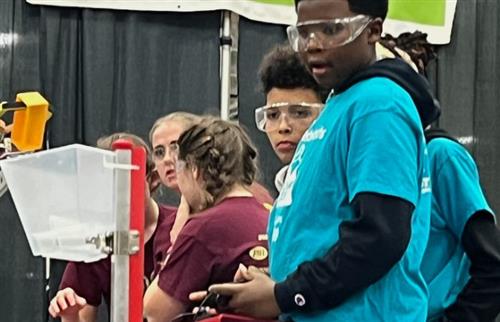 student at robotics competition